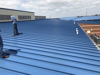 detailed roof inspections of Kynar 500 coated roof panels