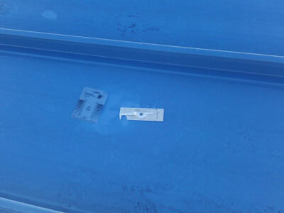 damage to Kynar 500 coated roof panels