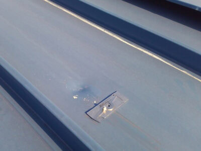 dents in Kynar 500 coated roof panels