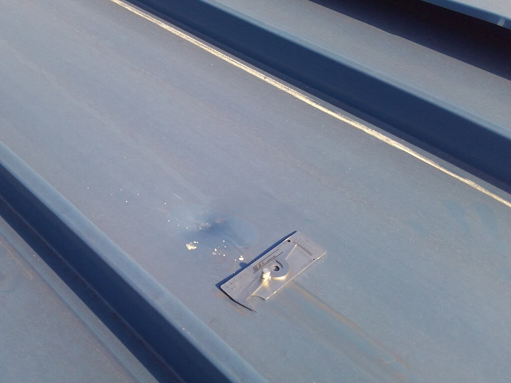 dents in Kynar 500 coated roof panels